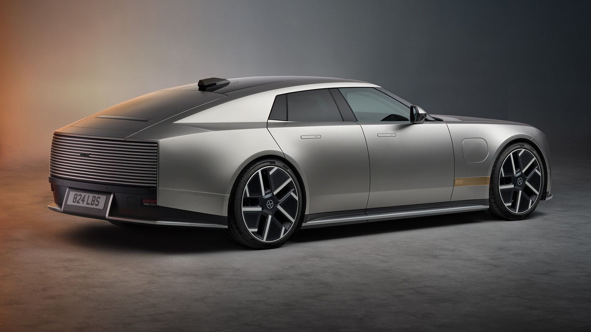 Jaguar Type 01 - A static image in silver with a focus on the rear-right side